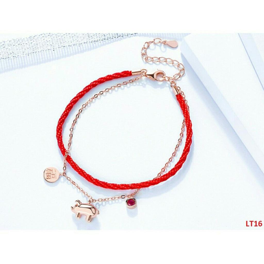 Lắc tay titan heo con chỉ đỏ may mắn BHLT143