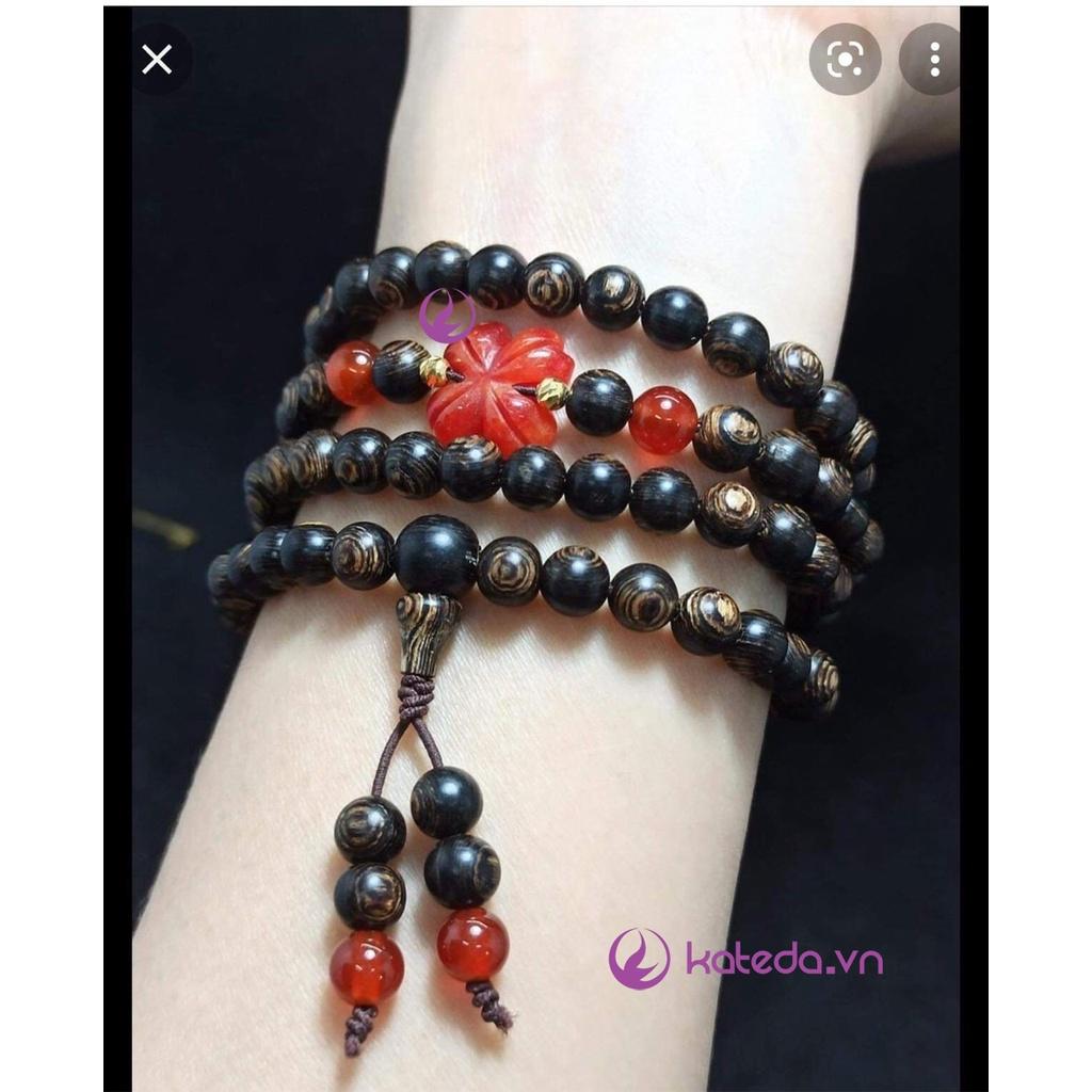 Cỏ bốn lá mix vòng tay dây thép , vòng gỗ .