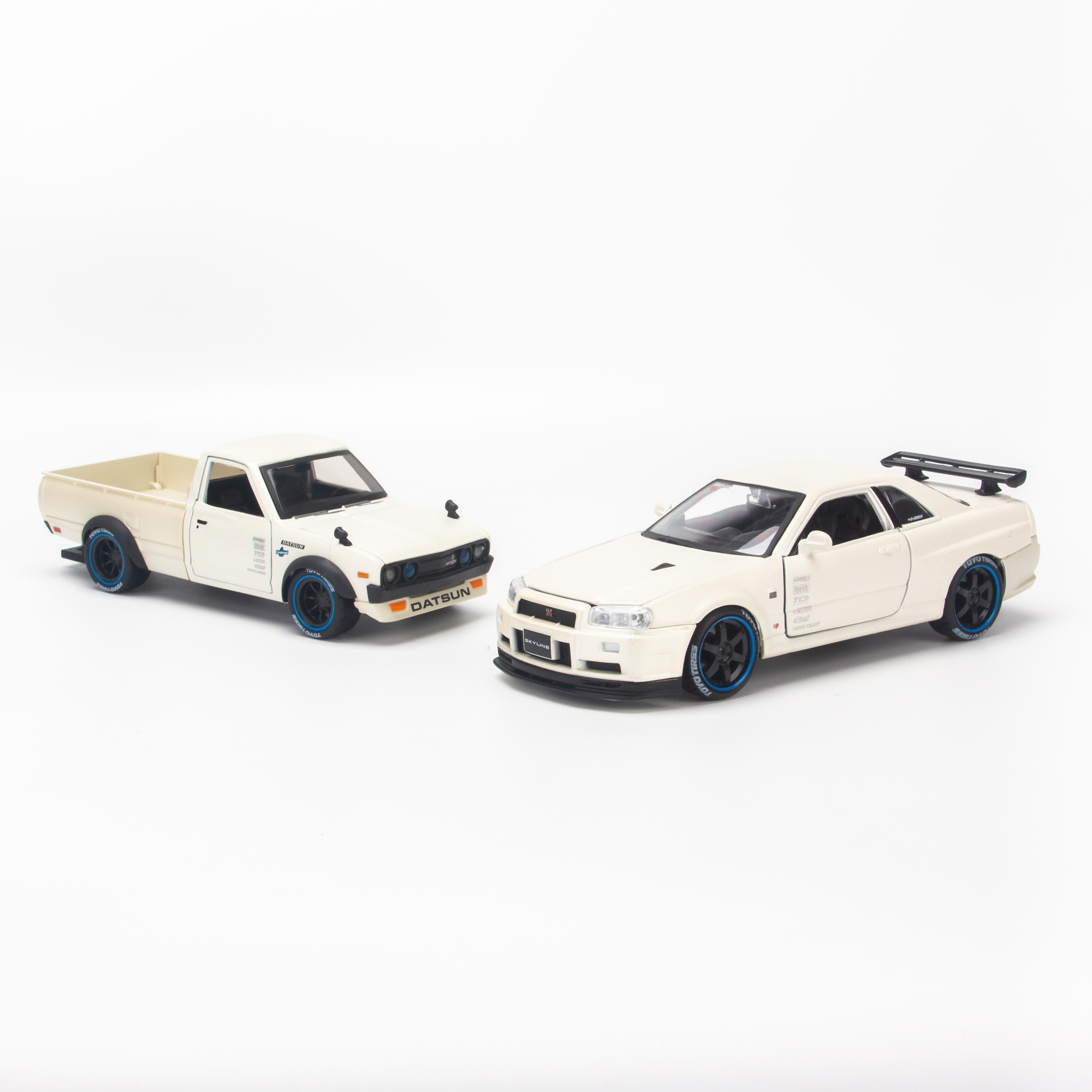 Mô hình xe Design Elite Transport - Nissan Datsun 73 Pick up + Skyline R34 1:24 Maisto - 32754