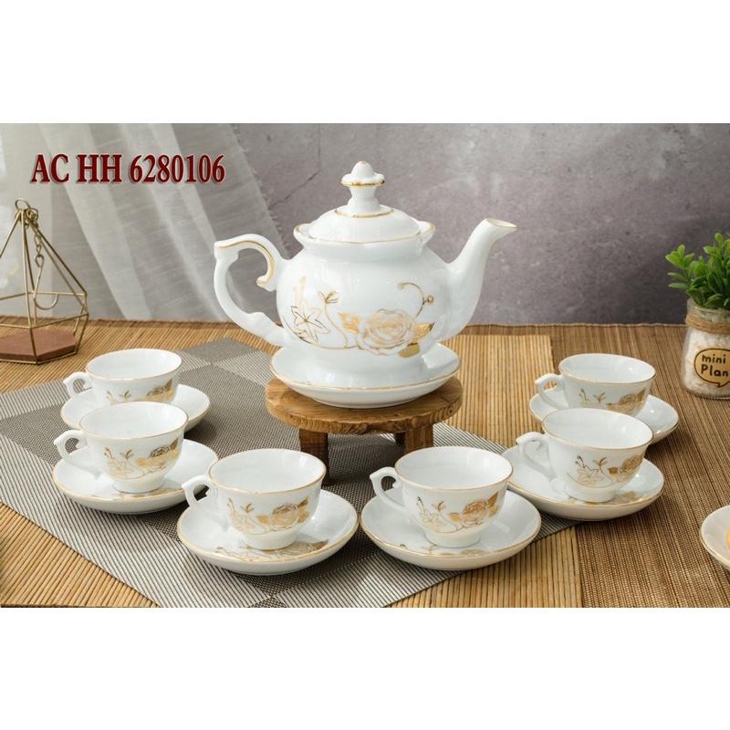 Bộ ấm trà men trắng ngà, họa tiết vẽ vàng. Gốm sứ Bát Tràng.