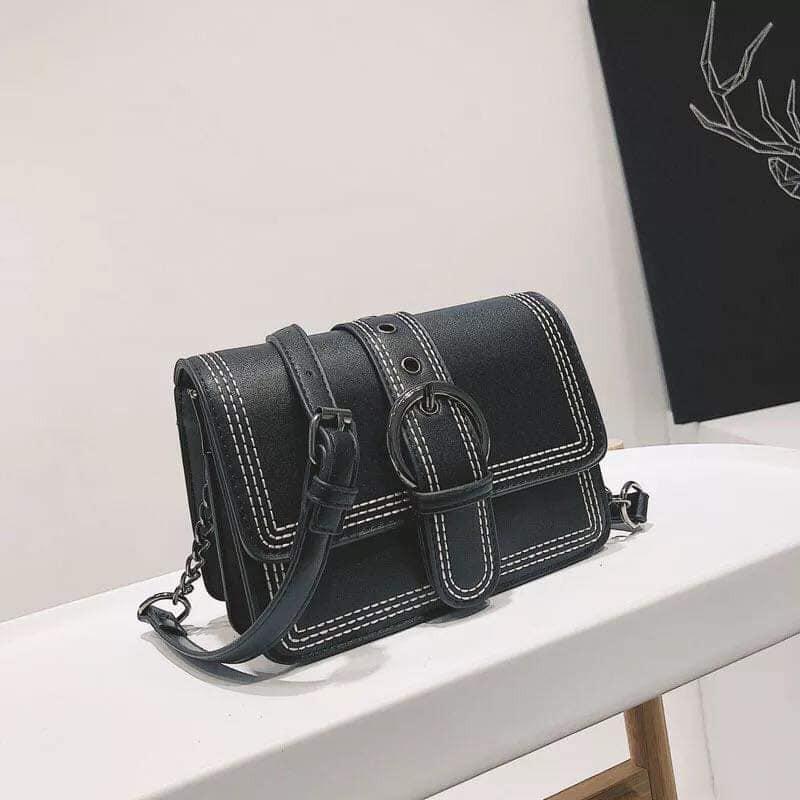 Túi khóa cài đen sữa