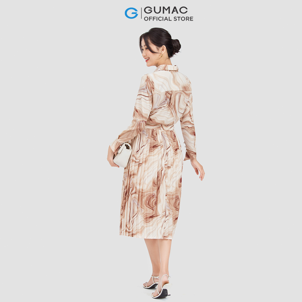 Chân váy dáng xòe GUMAC VC06031 dập ly