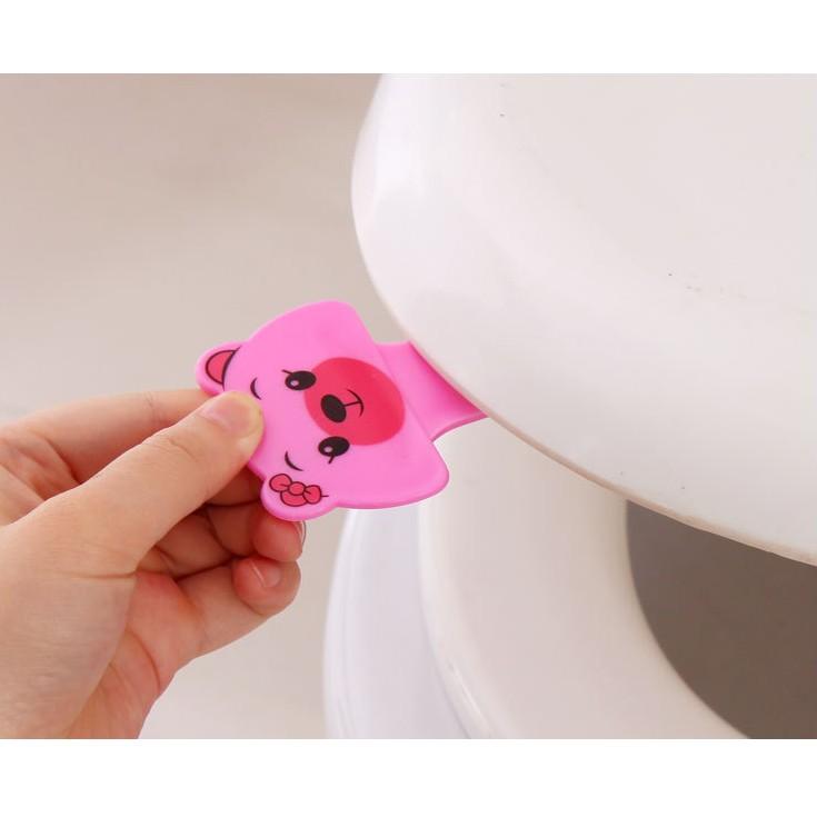 Miếng nhấc nắp bàn ngồi toilet