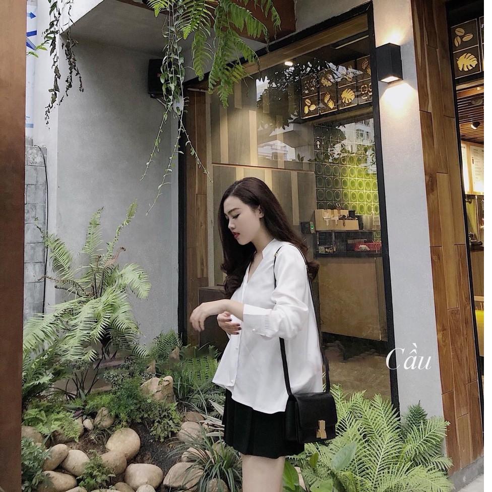 Áo sơ mi nút ngọc