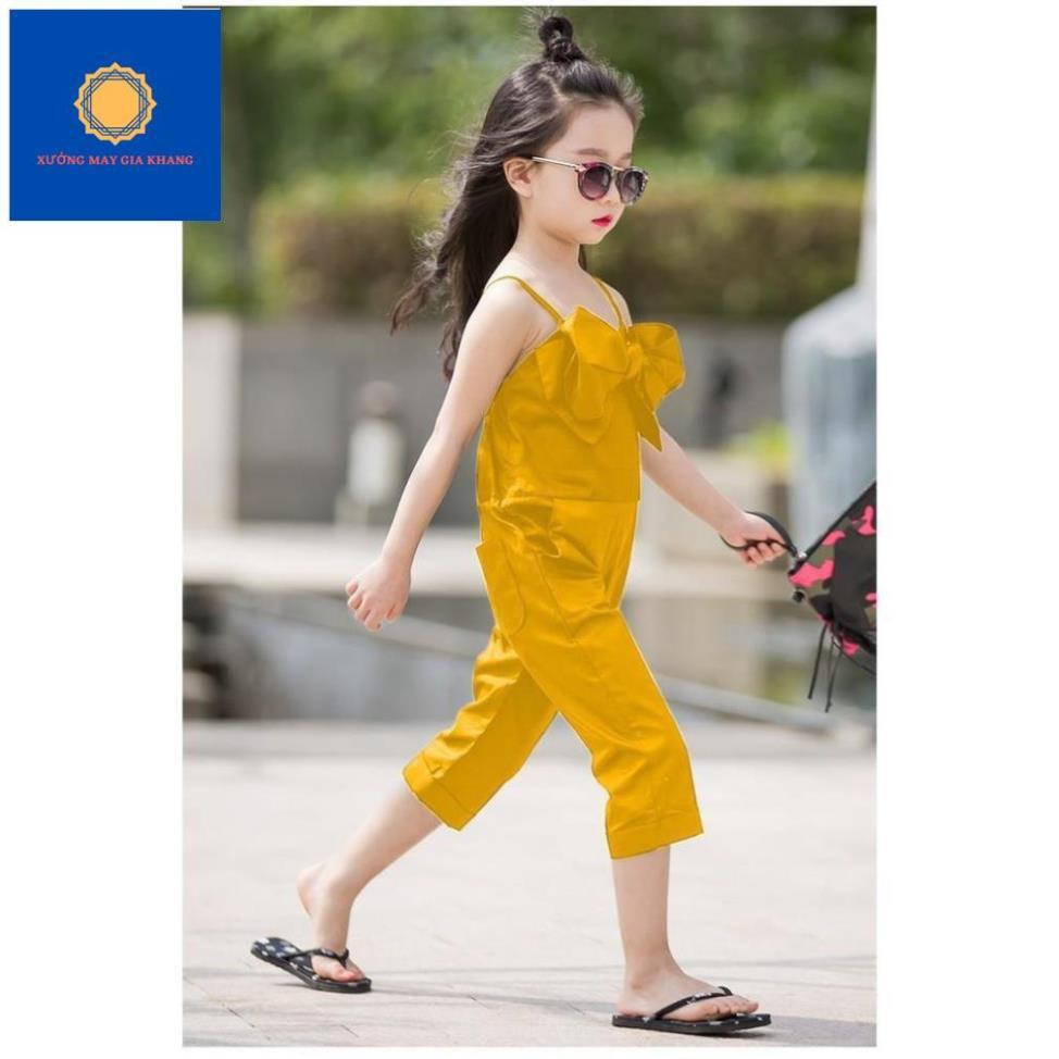 Jumsuit bé gái sành điệu, với chiếc nơ to được đính trước ngực lạ mắt - Xưởng may - Gia Khang.