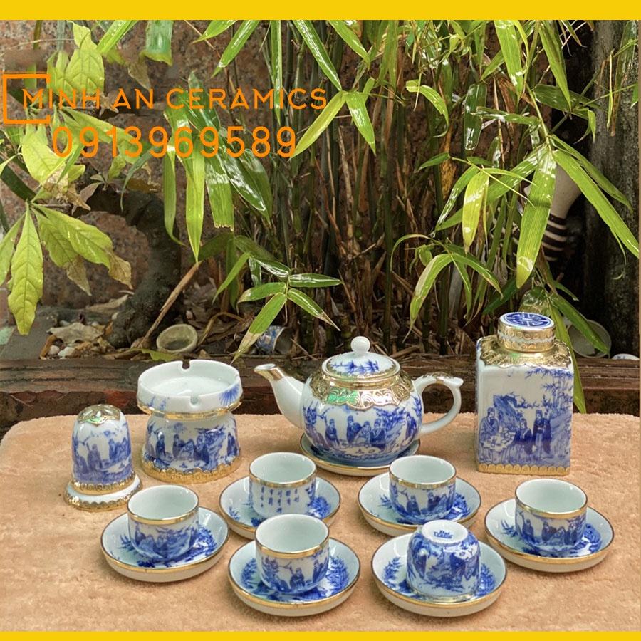 Bộ ấm trà gốm sứ Bát tràng men lam vẽ trúc lâm thất hiền bọc đồng vàng gốm Minh An Bát Tràng dáng ấm quả hồng