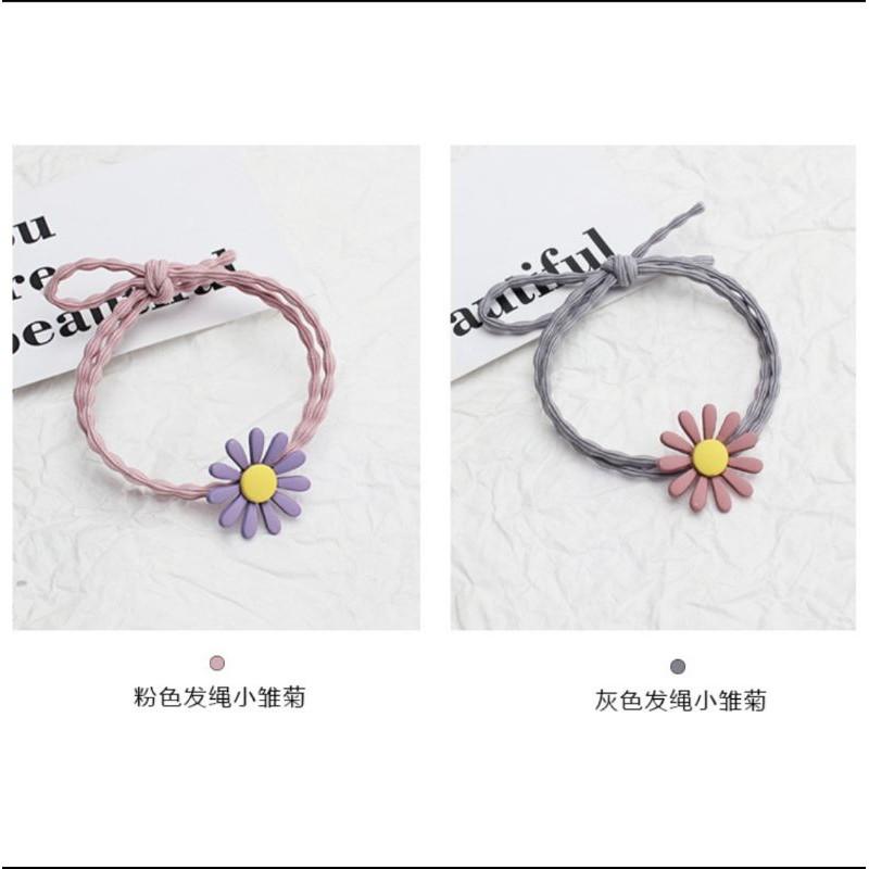 Xả buộc tóc hoa cúc siêu đáng yêu