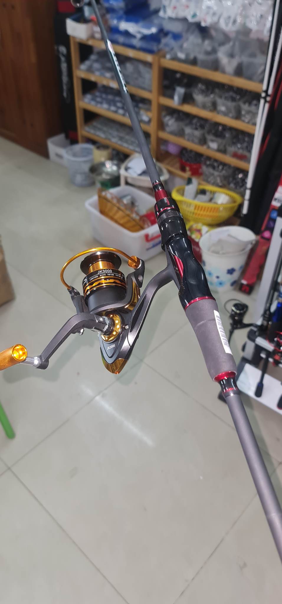 COMBO cần RED lure 2.1m và máy câu JK-3000