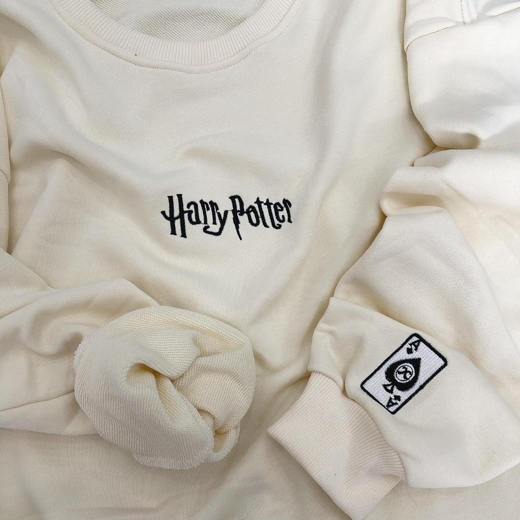 Áo sweater tay dài chữ harypotter