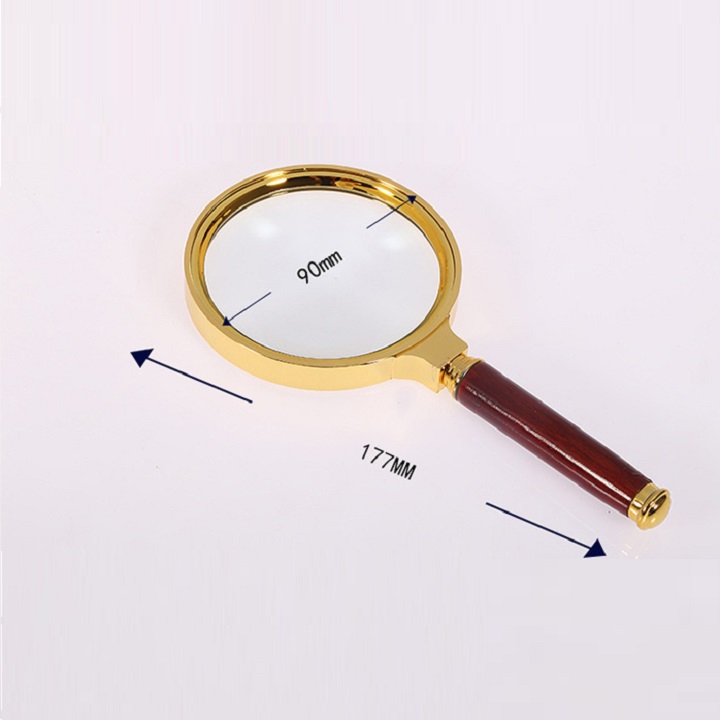 KÍNH LÚP 90mm VIỀN VÀNG có tay cầm tiện ích cho học sinh, người lớn đọc sách báo...