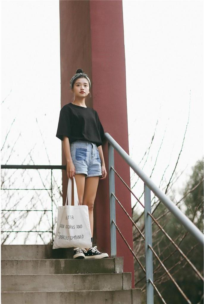 Áo thun nữ cổ trònform rộng tay lỡ chất vải 100%cotton