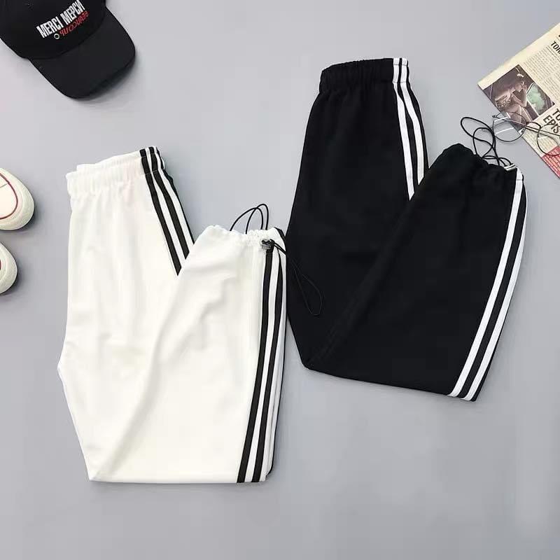 Quần jogger nam nữ 3 sọc,dây rút, thể thao đủ size fom rộng unisex