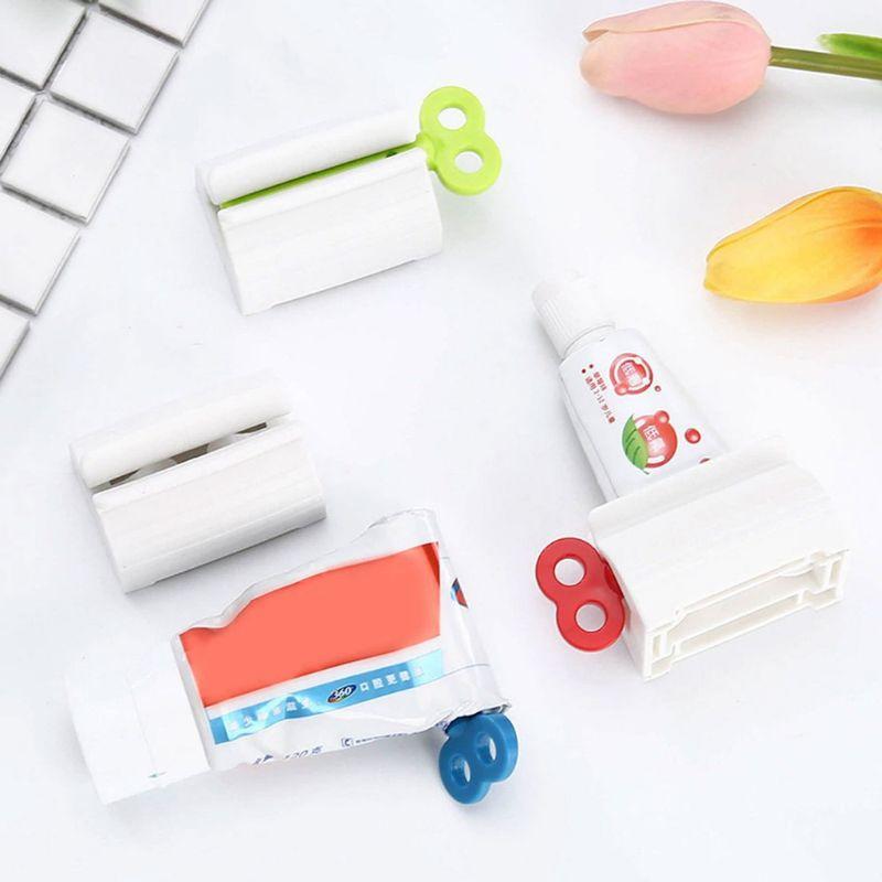 DỤNG CỤ KẸP NẶN KEM ĐÁNH RĂNG MẪU MỚI CHẤT LIỆU NHỰA CỨNG
