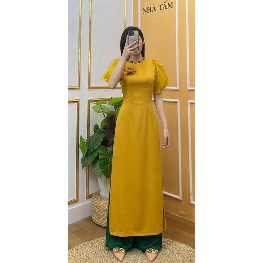 Áo dài thiết kế cúc bọc viền cổ phối hoa ngực