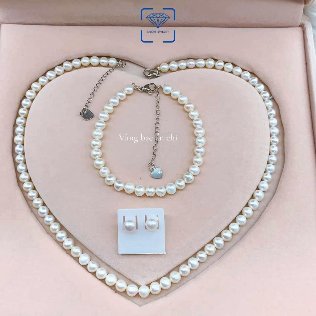 Bộ trang sức trai thật 8ly gồm vòng tay - vòng cổ chocker - bông tai, khóa chốt chất liệu bạc. Trang sức Anchi