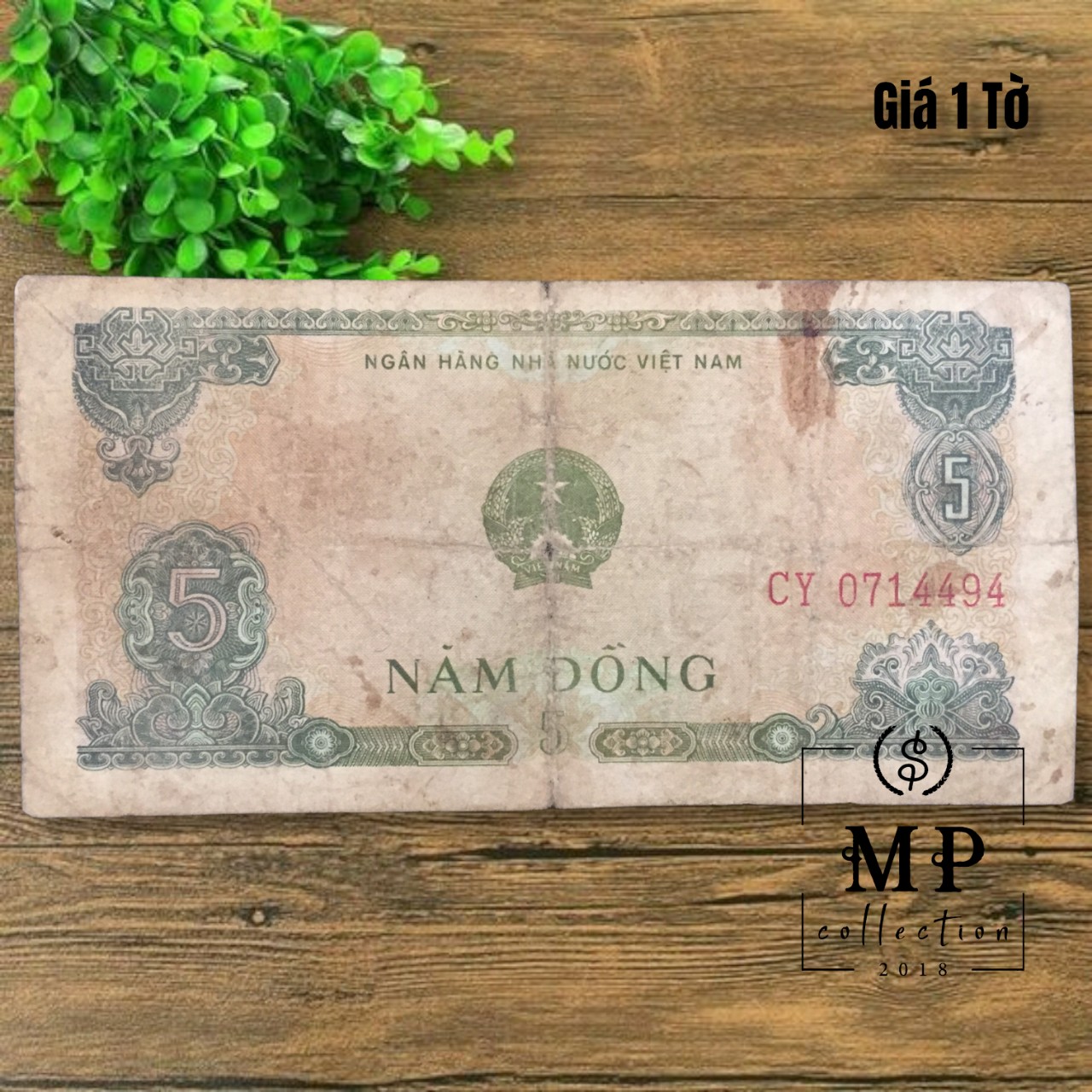 5 đồng 1976 cũ với hình ảnh người dân Việt đánh cá.