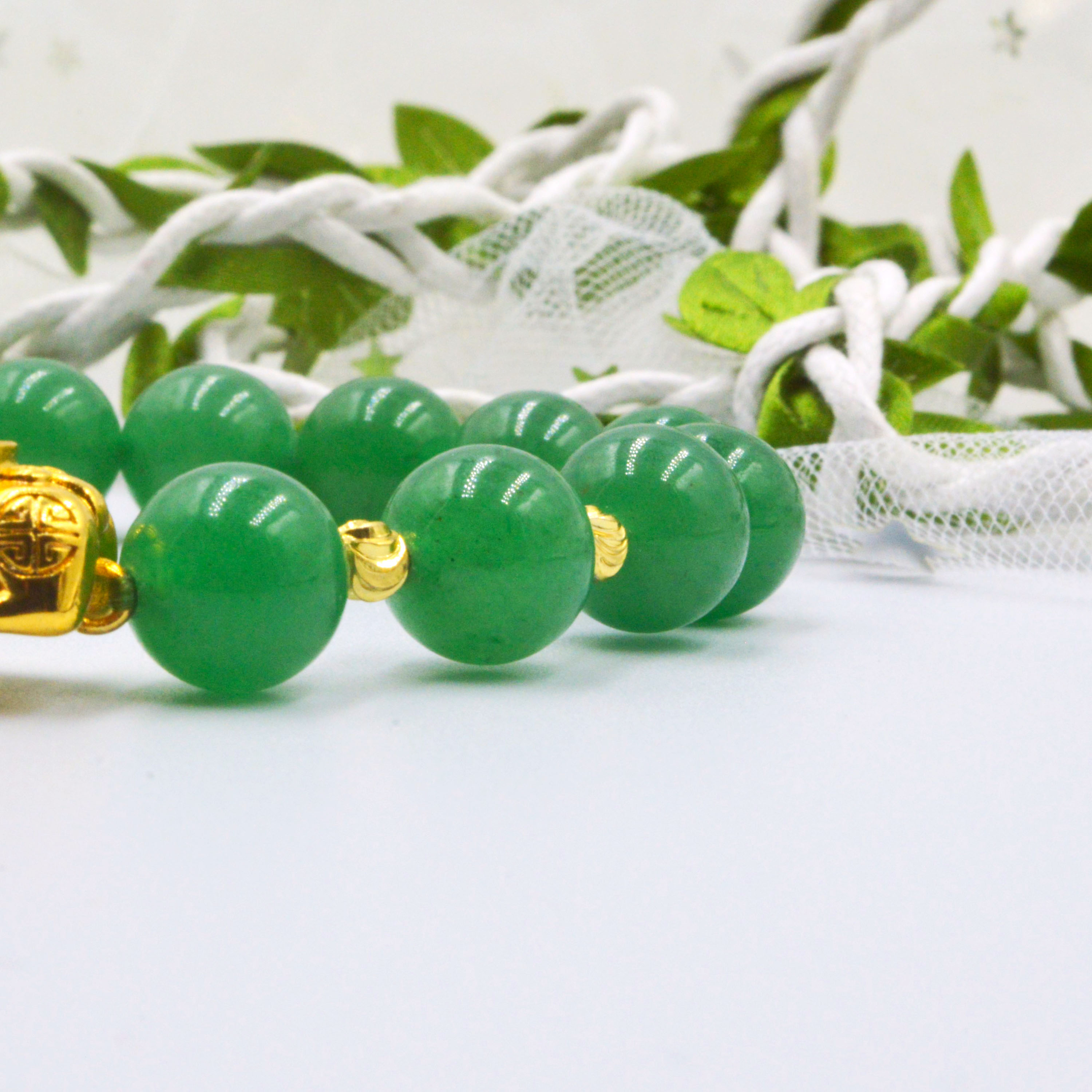 VÒNG TAY TỲ HƯU HỢP KIM VÀNG ĐẾ NAM CHÂM XOAY PHỐI MANAO XANH LÁ