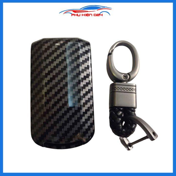 Ốp vỏ bọc chìa khóa xe Attrage sợi nhựa cacbon kèm móc treo Inox
