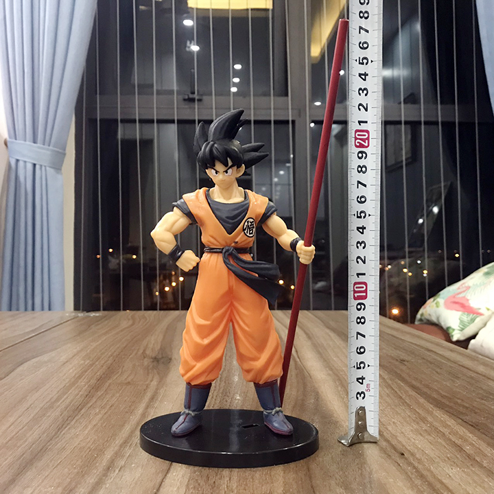 Mô Hình Songuku Cầm Gậy. Mô Hình Dragon Ball. Sản phẩm làm từ nhựa PVC đặc siêu xịn và đầm tay. Bày Taplo ô tô, tủ sách, decor trang trí phòng khách, bàn làm việc. Đồ chơi làm quà tặng cho trẻ em cực kỳ thú vị