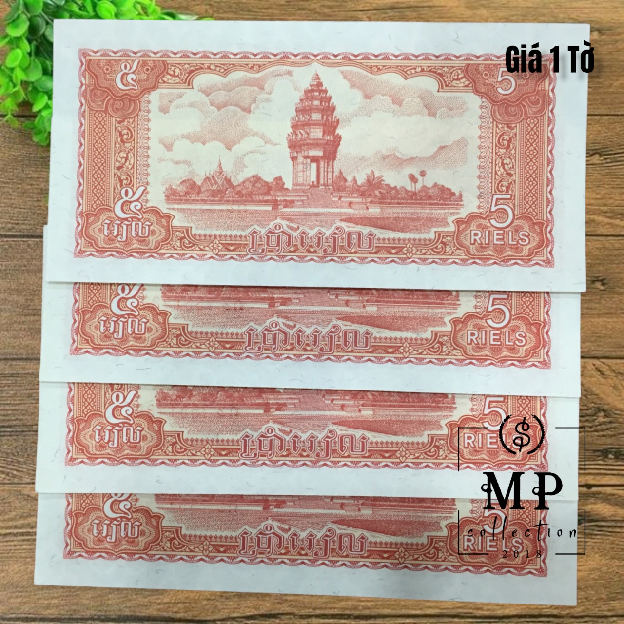 Tiền Cambodia 5 riels 1987 với hình ảnh quân đội, nông dân, công nhân và cán bộ chụp hình chung.