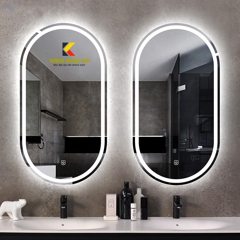 gương cảm ứng đèn led treo tường oval elip bầu dục nhà tắm phòng wc trang điểm makeup decor phôi gương bỉ AGC cao cấp kích thước 50x90cm và 60x100cm guonghoangkim mã HK-2006