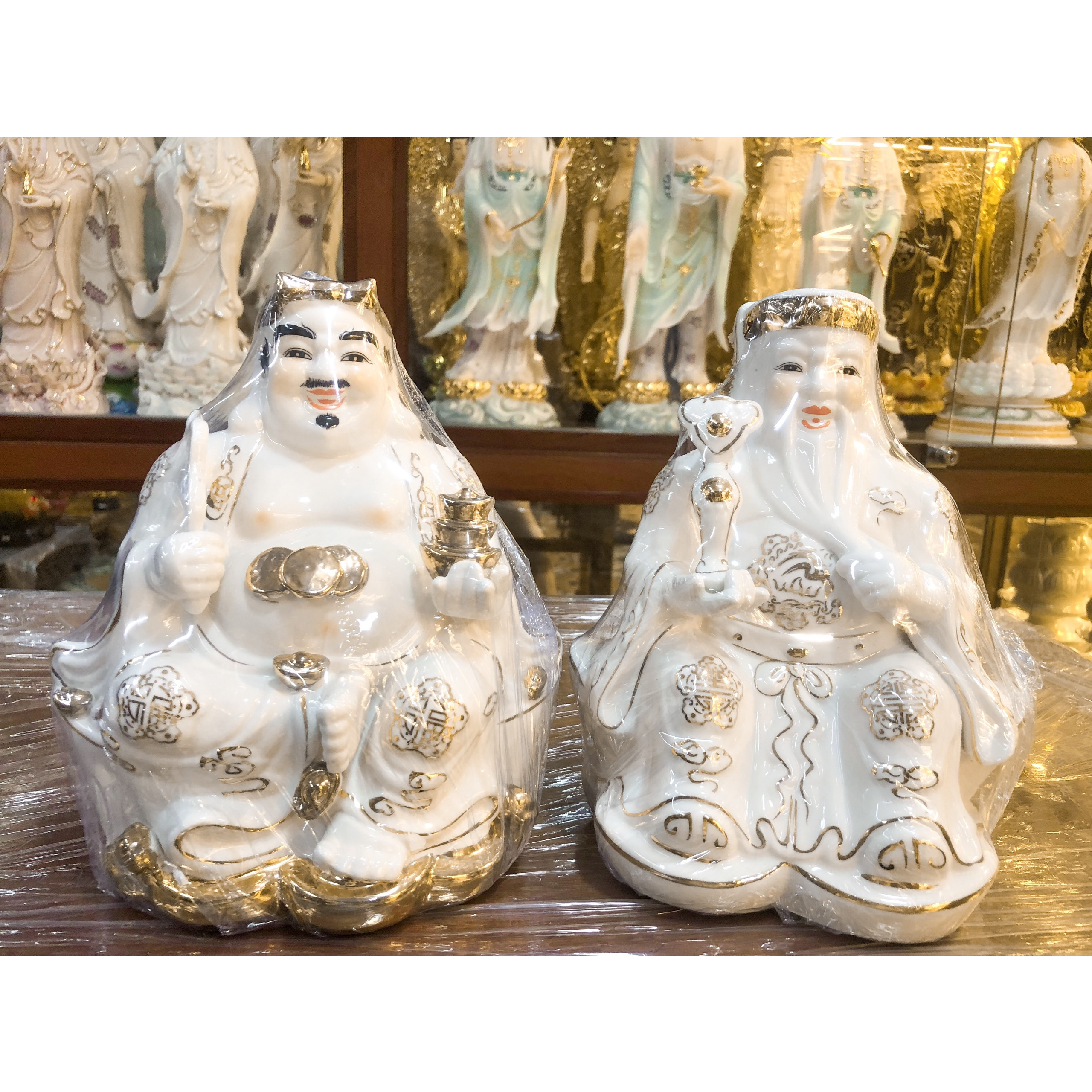 Tượng địa tài thổ địa gốm sứ viền vàng có gậy như ý