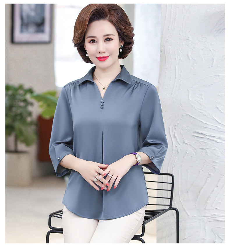 Áo sơ mi trung niên vai rúm mềm mại.