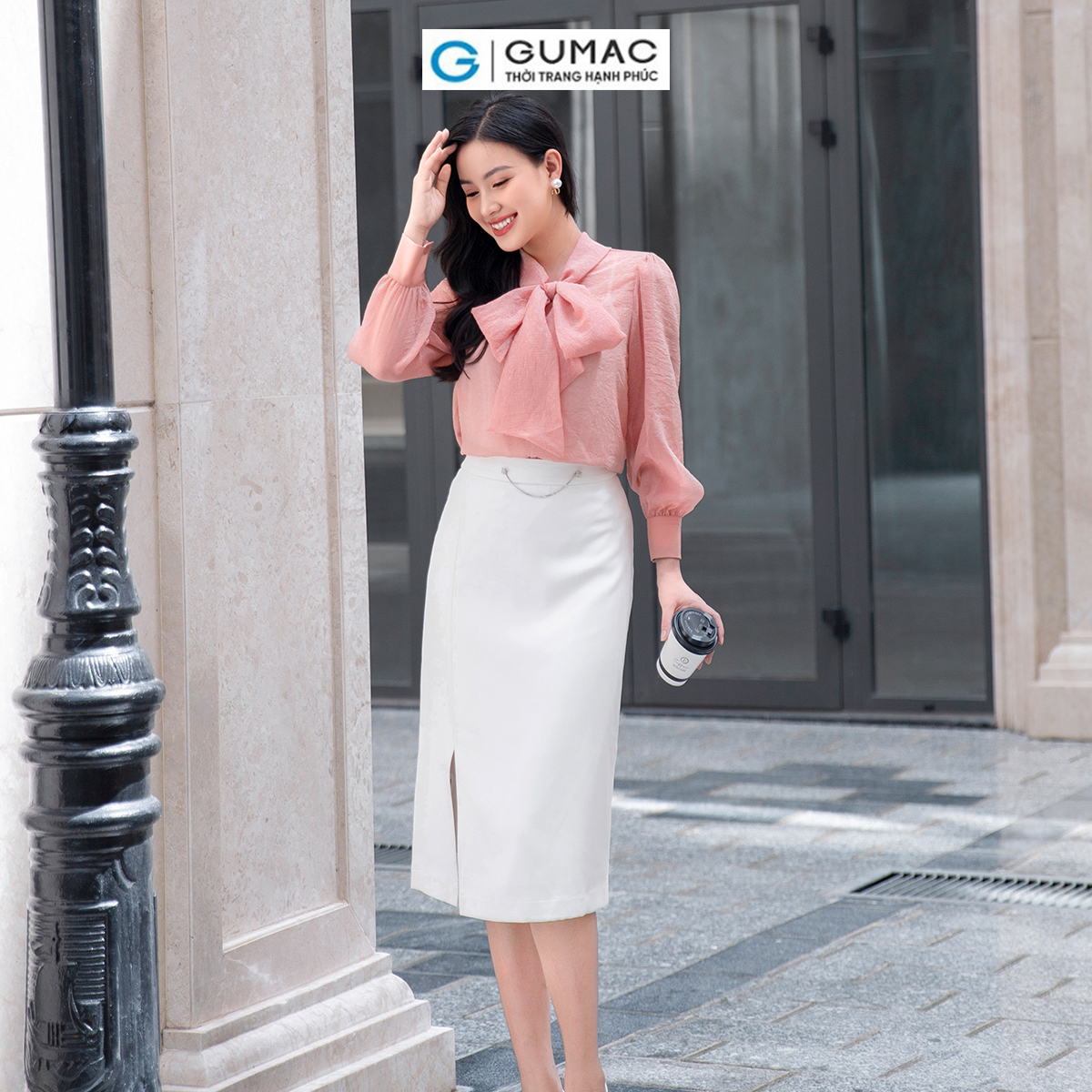 Chân váy phom suông, đường rã dọc hông váy tạo kiểu xẻ trước VD09029