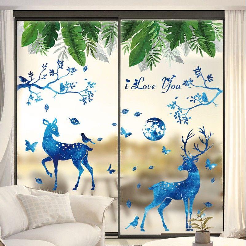 Decal dán tường đôi nai và tán lá xanh