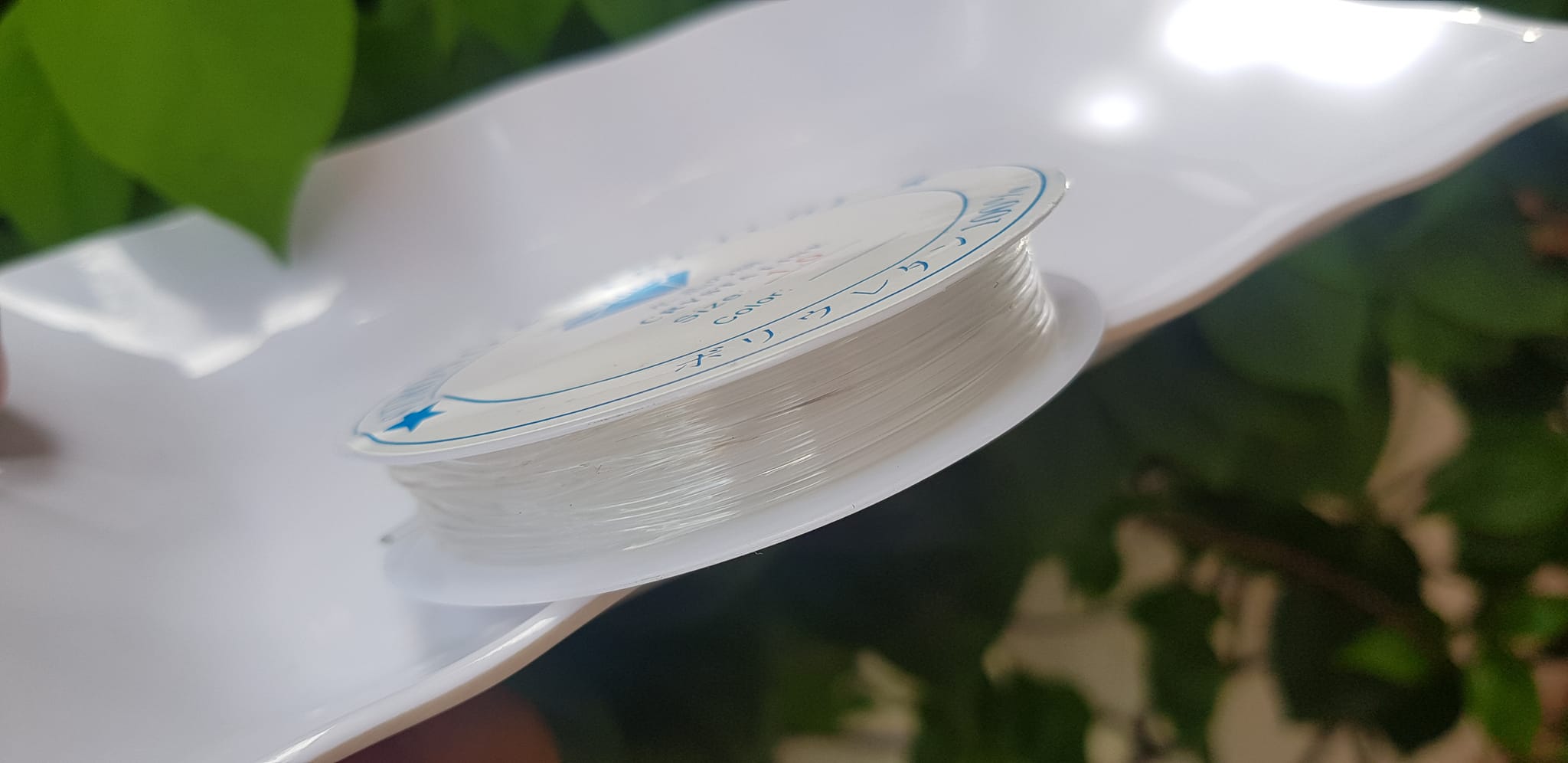 Khoanh tròn cuộn Thun Dẻo Màu trắng nhỏ chuyên xỏ tất cả vòng đeo tay Thun dẻo trắng xỏ vòng tay nam nữ ạ