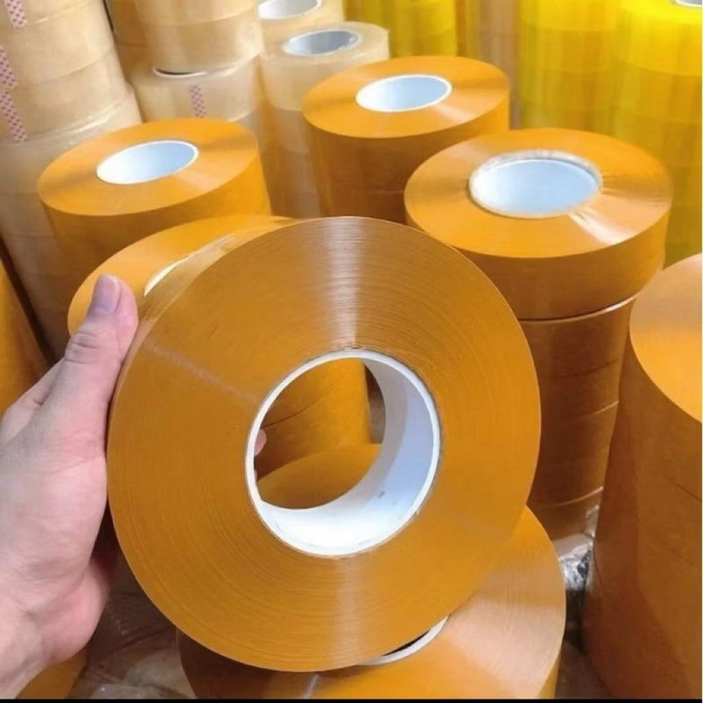 Băng dính và băng keo 1kg/1cuộn Độ Bám Dính Siêu Tốt Chống Thấm Nước Dễ Kéo Dài Và Bền Màu Sắc Trong Vàng Đục Chất Lượng Cao bang dinh