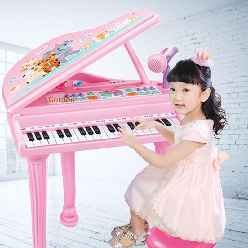 Phong cách mới nhất âm nhạc đa chức năng đàn piano nhỏ đàn organ điện tử có ghế micro giáo dục sớm cho người mới bắt đầu sạc điện thoại di động cho bé gái
