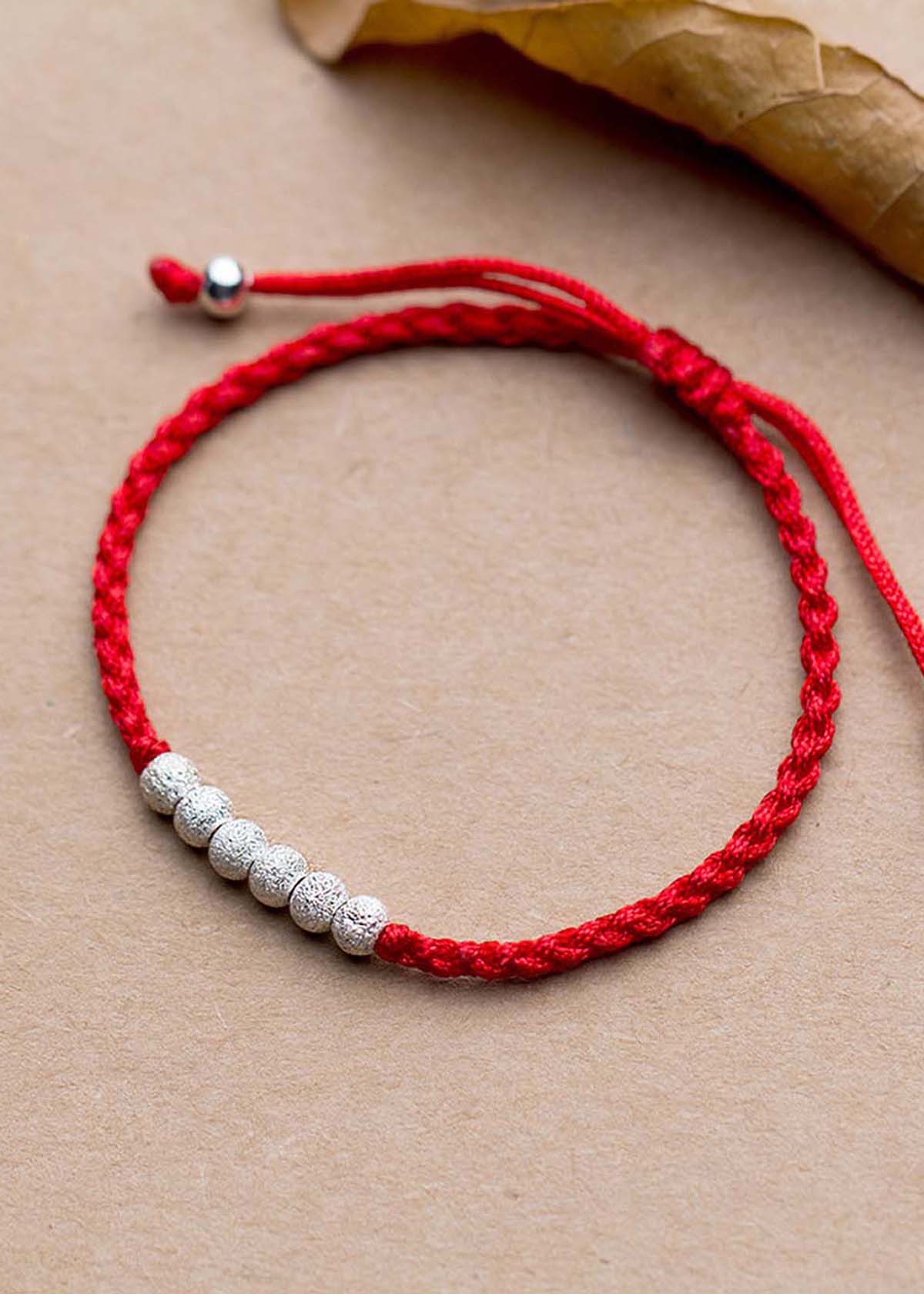 Combo 2 vòng thắt dây đỏ charm bạc - Ngọc Quý Gemstones