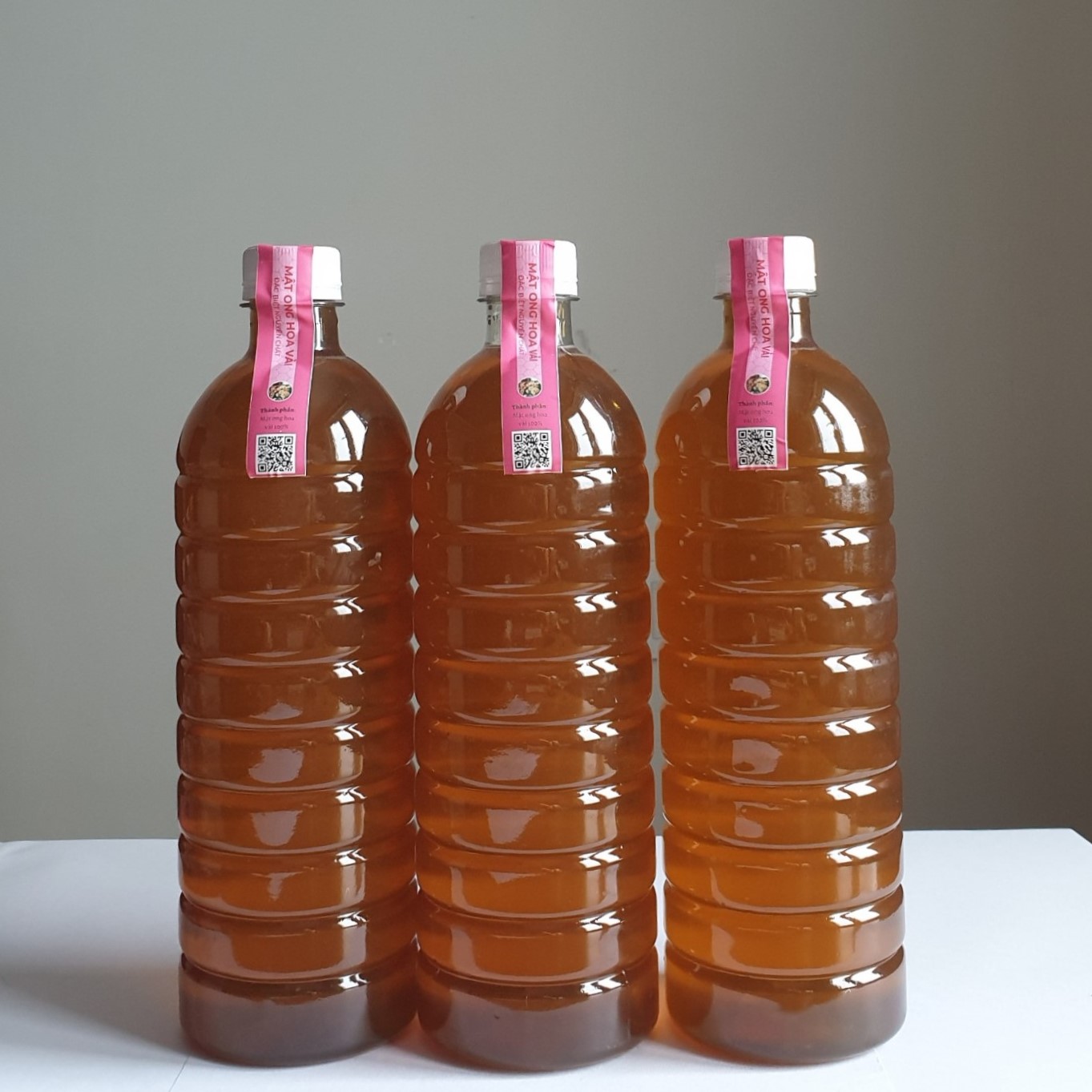 Mật ong hoa VẢI đậm đà 100% 1 lít không tem - Thế Hồng Honey