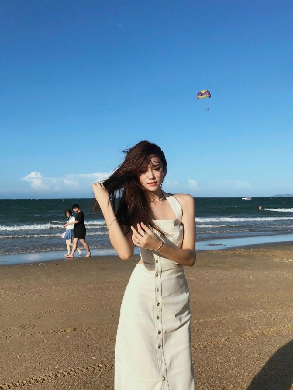 Đầm váy midi cut eo lưng xẻ tà