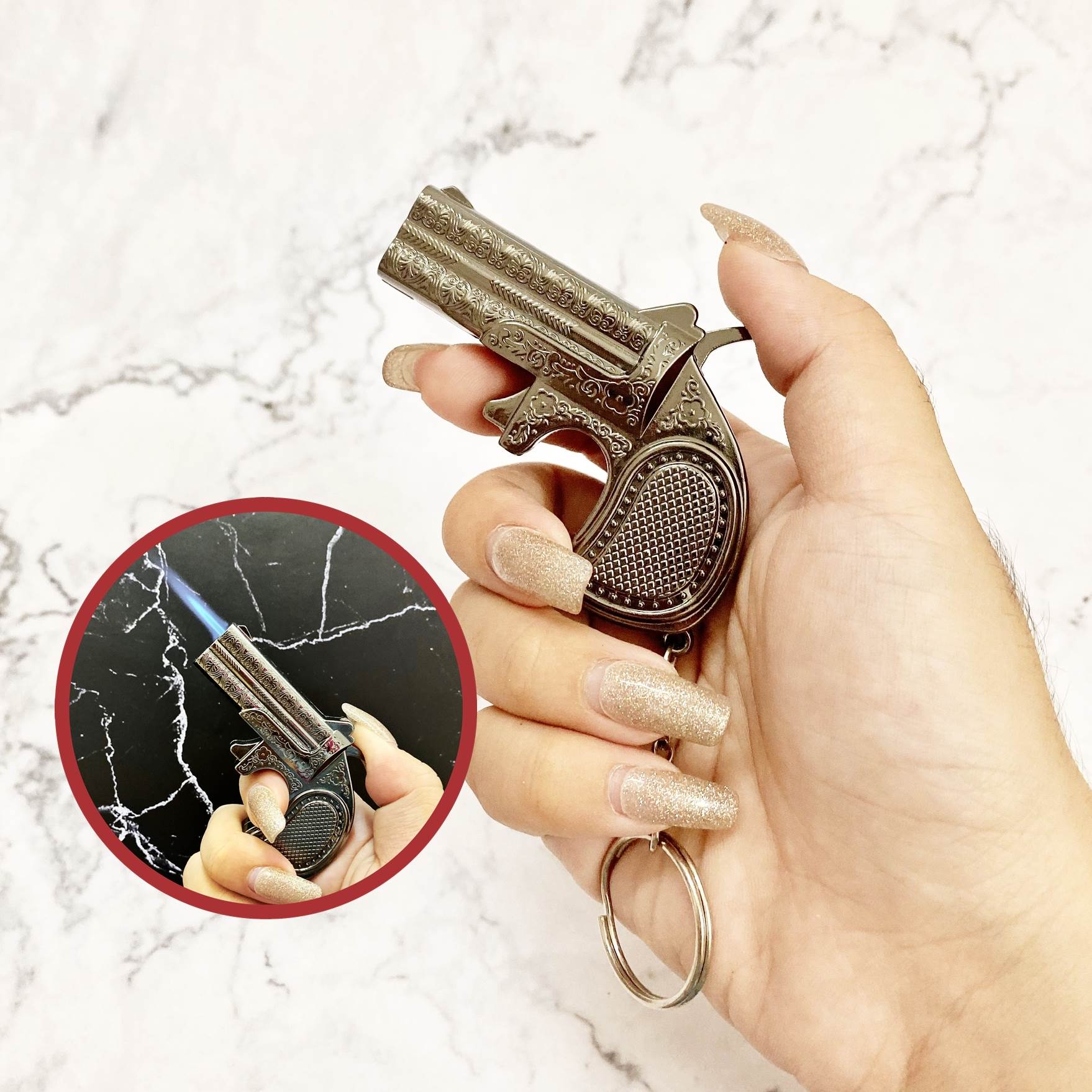 Hột quẹt bật lửa khè móc khóa hình súng hoa văn vàng -
