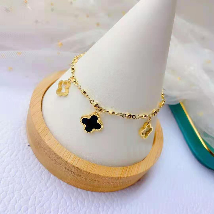 Lắc tay nữ titan hoa 4 cánh ver9 WVT641 Không đen không gỉ sét