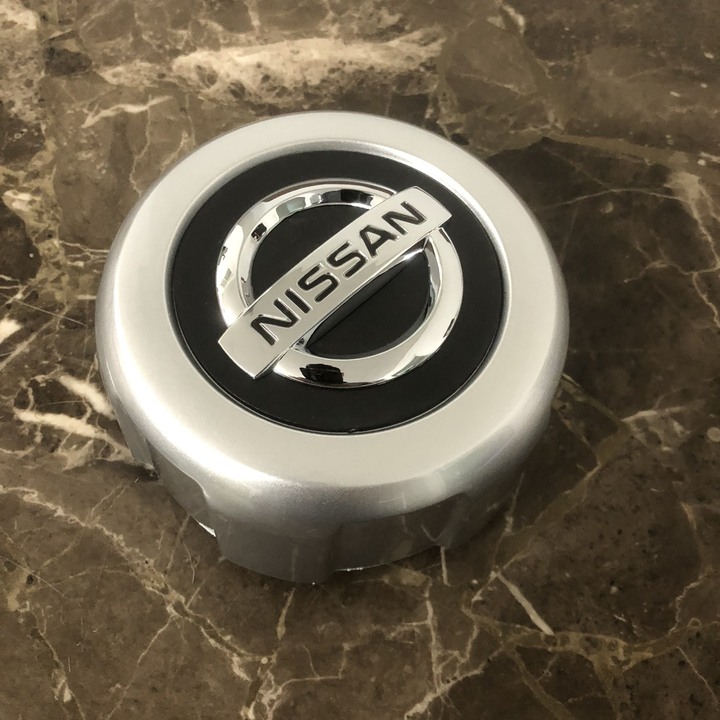1 Chiếc logo chụp mâm, ốp lazang dành cho bánh xe ô tô một số dòng của Nissan NS-046, chất liệu nhựa ABS, đường kính chân cài 12cm, cao 5cm