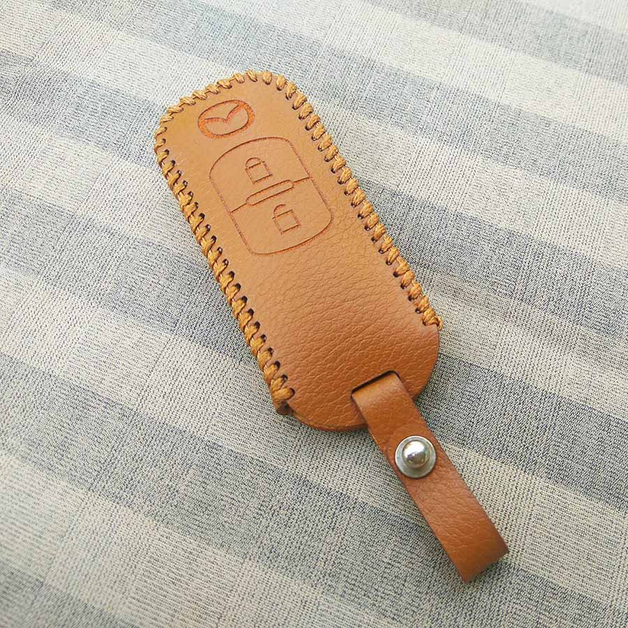 Bao da 2 nút chìa khóa smartkey xe hơi Mazda