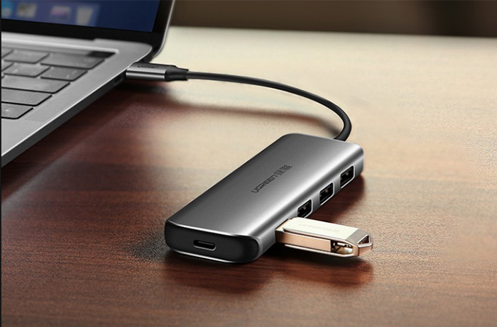 Hub USB Type-C ra 4 cổng USB 3.0 hỗ trợ cổng USB-C cấp nguồn chính hãng Ugreen 50980 cao cấp