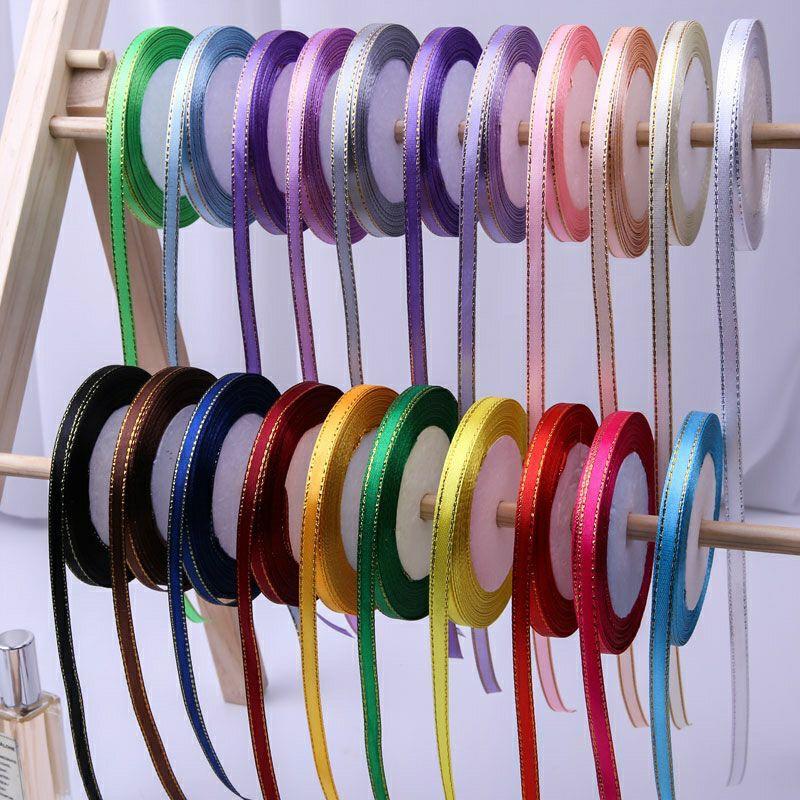 1 lốc 10 cuộn ruybang 1cm viền kim tuyến