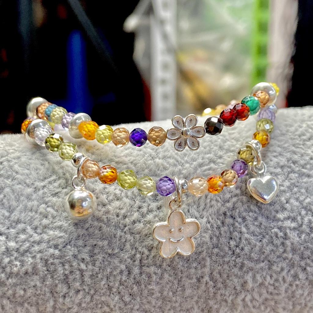 Vòng tay đa sắc cắt giác mix charm bạc