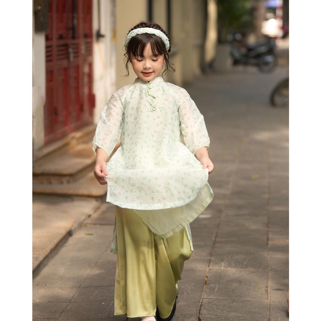 Áo dài bé gái BYZU chất vải tơ đính nơ ngực tay bồng bềnh, hoa nhí xinh xắn