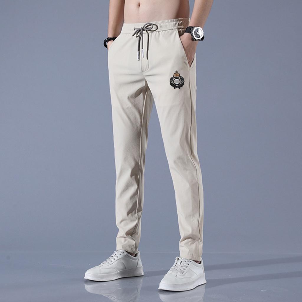 Quần Dài Jogger Nam Ống Côn Phong Cách Hàn Quốc, Chất Vải Si Gió Mềm Mịn, Cạp Chun, Thêu Logo Phong Cách