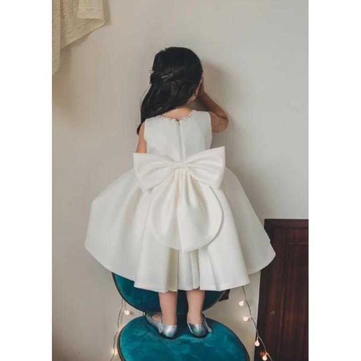 Đầm công chúa satin trắng đính nơ to sau lưng cho bé từ 1 - 12 tuổi