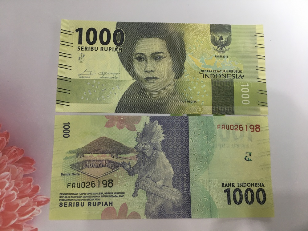Tiền 1000 Rupiah của Indonesia màu xanh lá, tặng phơi nylon bảo quản tiền