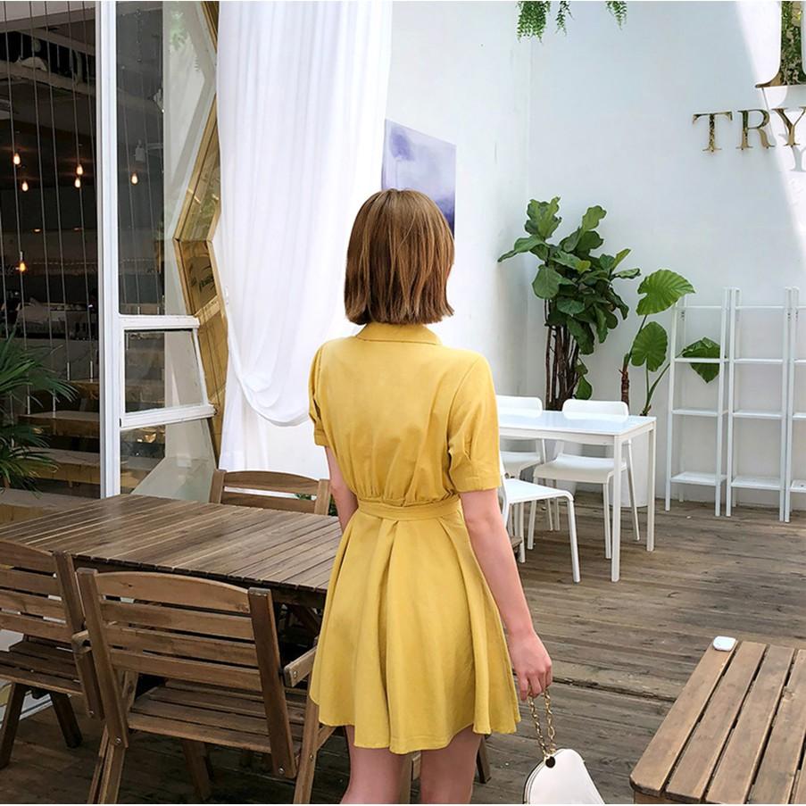 Đầm công sở hồng và vàng cổ vest cột nơ eo