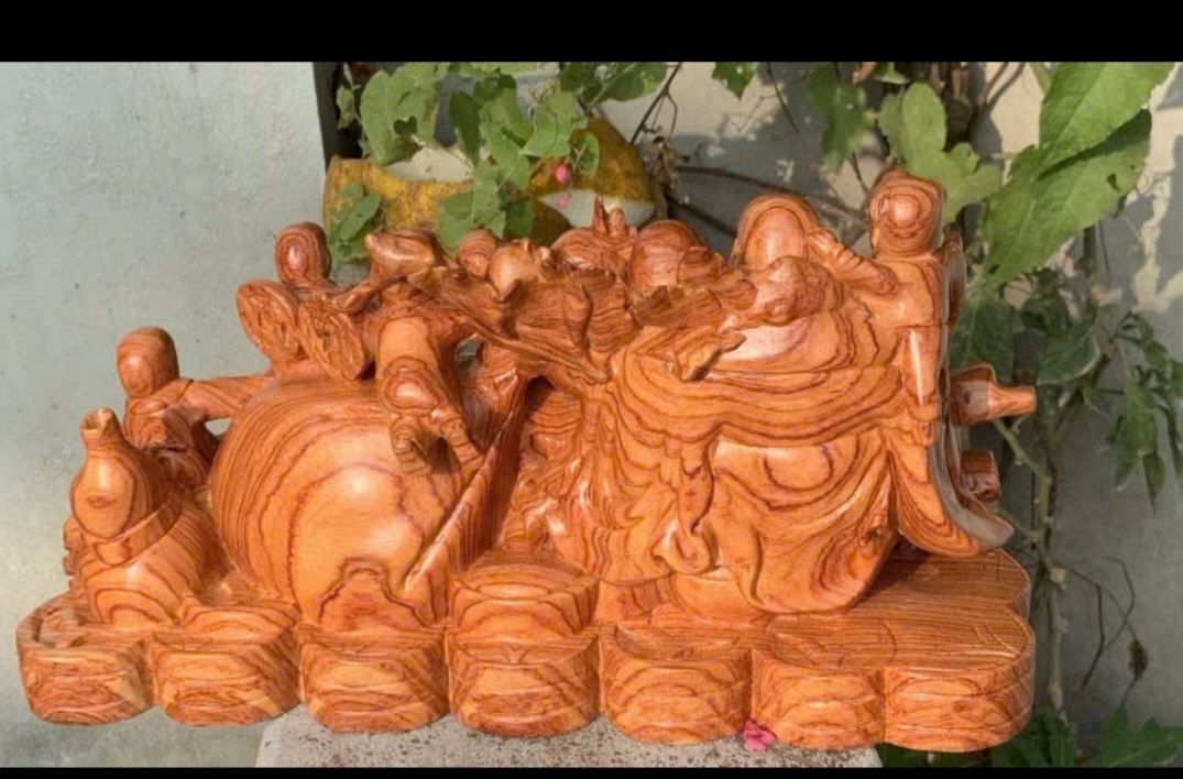 Tượng phật di lặc ngũ phúc kéo bao vàng bằng gỗ hương đá  kt 40x20x13cm