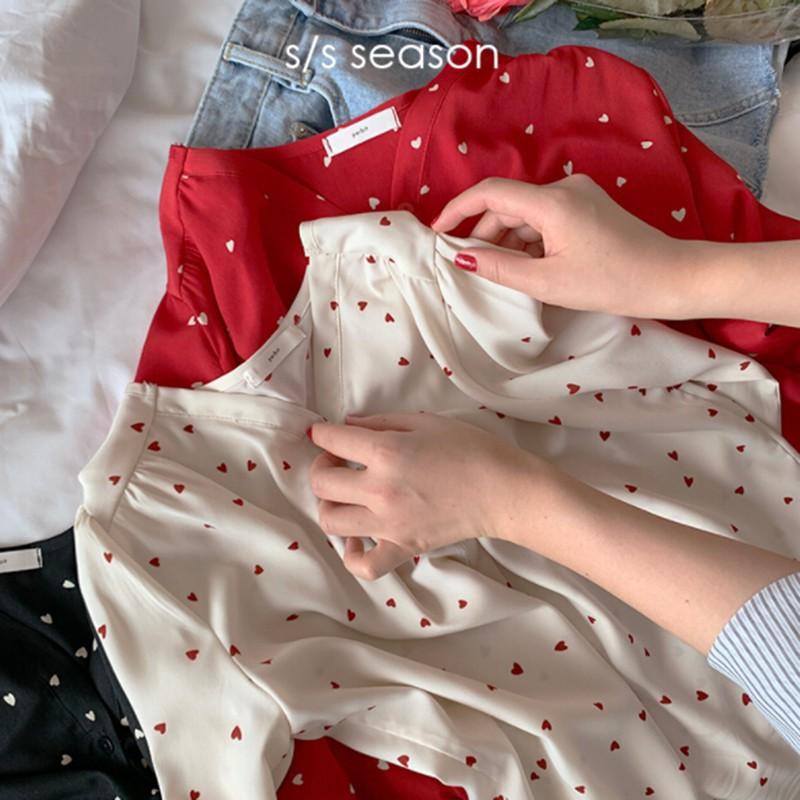 Áo kiểu tay dài dáng rộng họa tiết in thiết kế cổ chữ V nữ tính