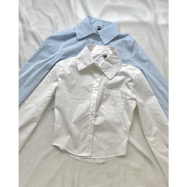 Sơ mi trơn phối túi dáng slimfit